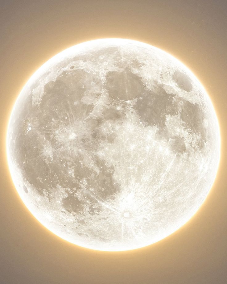 an airplane flying in front of a full moon with the sun shining down on it