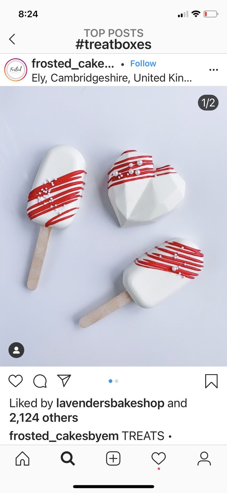 two lollipops with red and white stripes on them are sitting next to each other