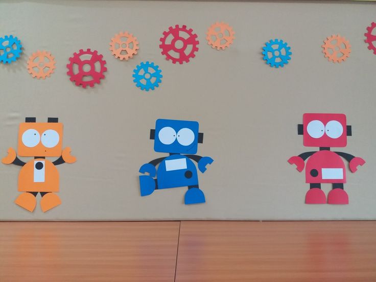 some paper cutouts are on the wall next to each other with different shapes and sizes