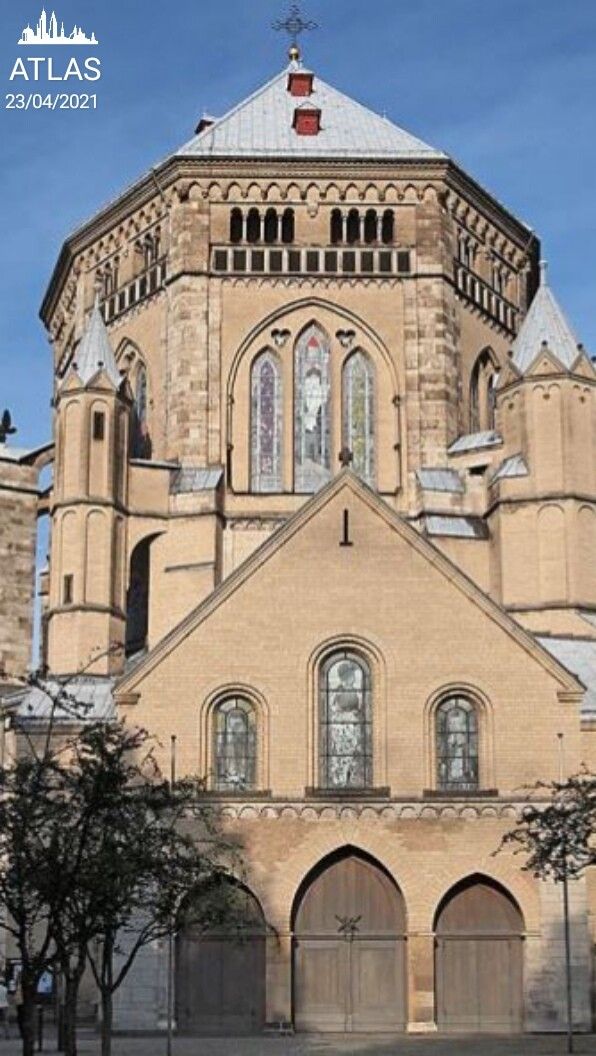 an old church with two large arched windows