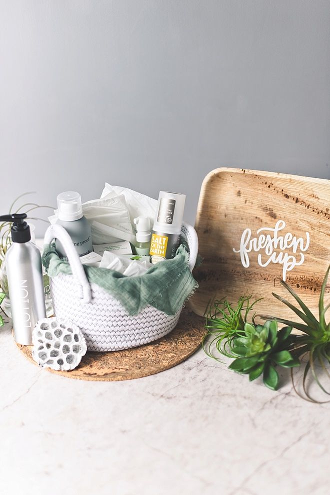 a basket filled with personal care items sitting on top of a counter next to a cutting board