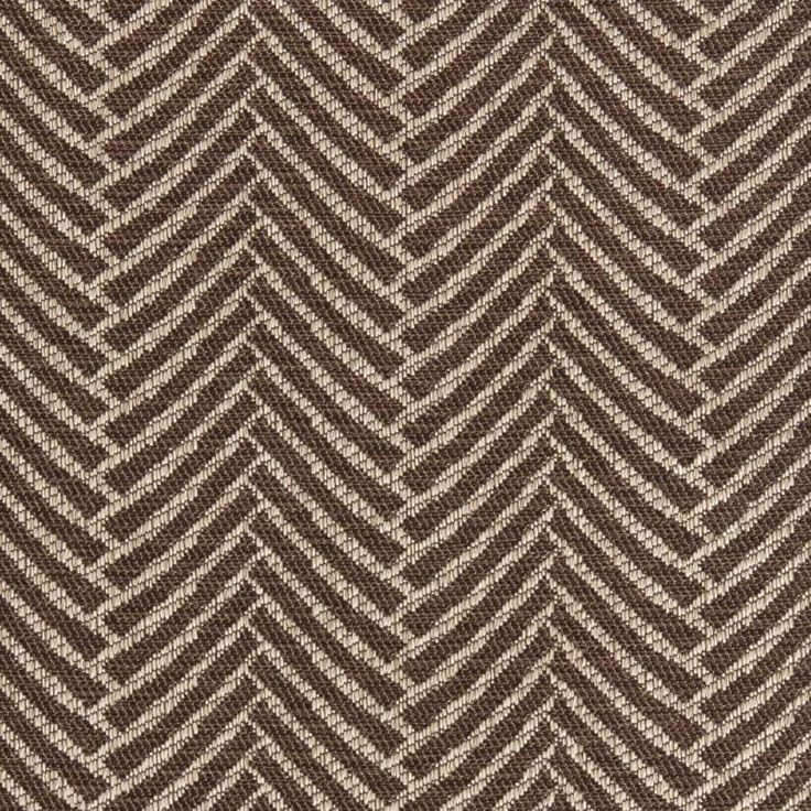 a brown and white chevroned pattern on fabric