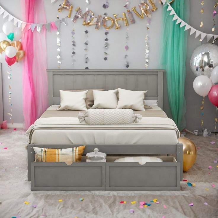 a bedroom decorated with balloons, streamers and confetti