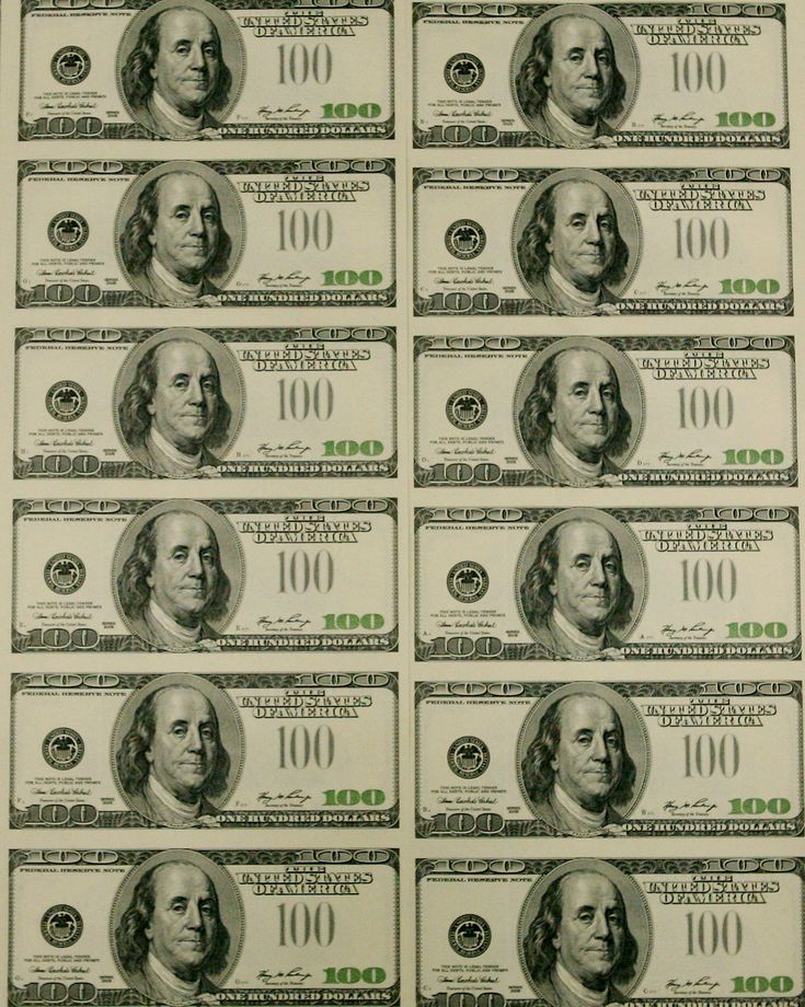 twenty dollar bills are arranged in rows