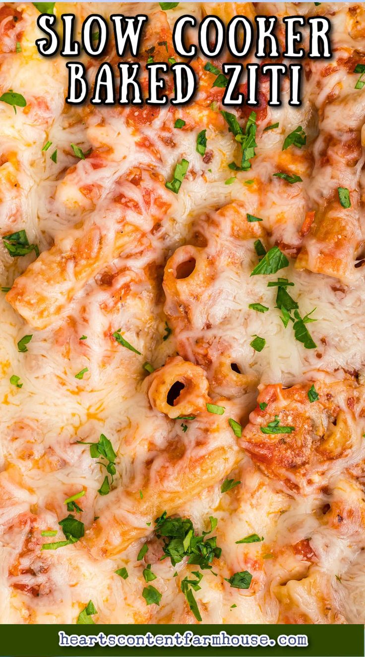 a close up of a pizza on a plate with the words slow cooker baked ziti