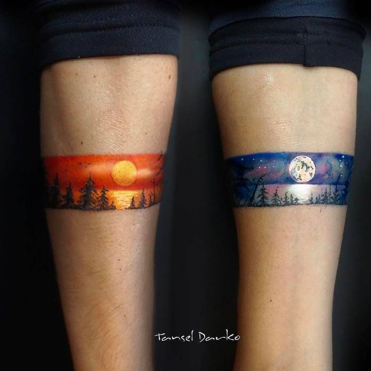 two people with tattoos on their legs and one is showing the same image as another