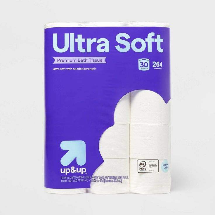 two rolls of ultra soft toilet paper on top of each other in front of a white background