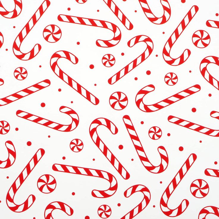 red and white candy canes on a white background