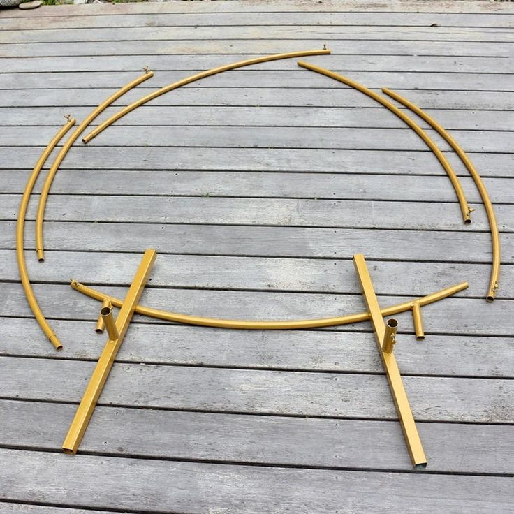 a circular metal object sitting on top of a wooden floor