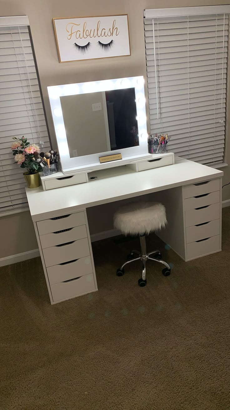 a white desk with drawers and a mirror