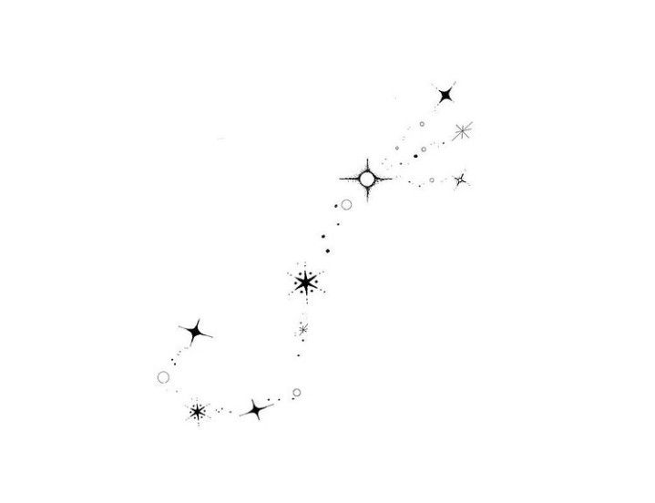 a black and white photo of stars in the sky with one star falling off it's side