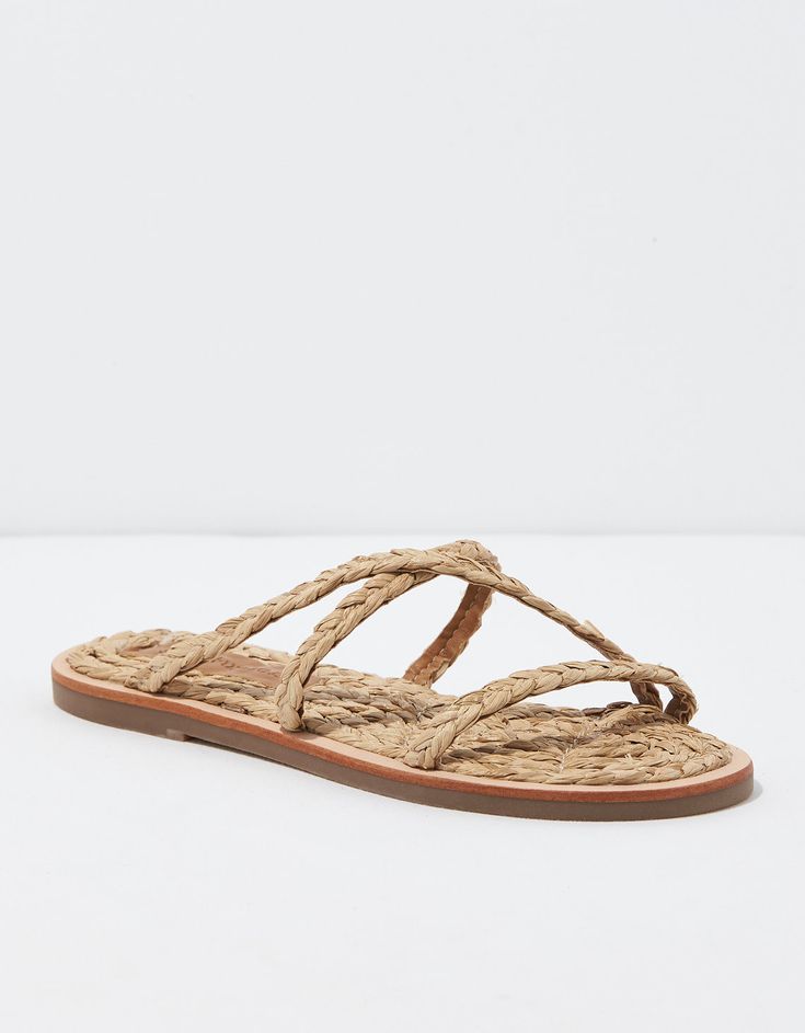 Round toe/Woven straps & footbed/Not eligible for promotions | Only ships within the USA Natural Sandals With Woven Sole And Single Toe Strap, Adjustable Natural Sandals With Textured Footbed, Natural Color Sandals With Braided Straps And Round Toe, Natural Color Round Toe Sandals With Braided Straps, American Eagle Outfitters, Women's Jeans, American Eagle, Salt, Women Jeans