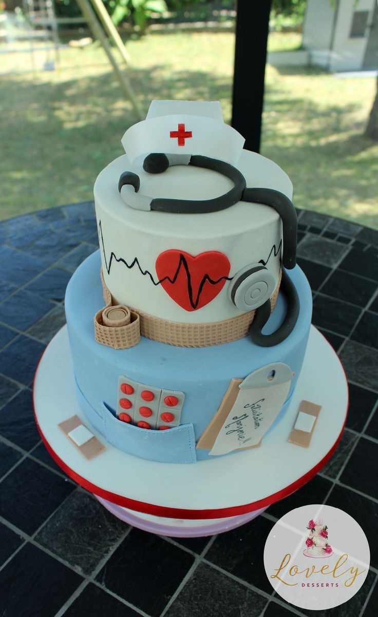 a cake that is on top of a table with a stethoscope in it