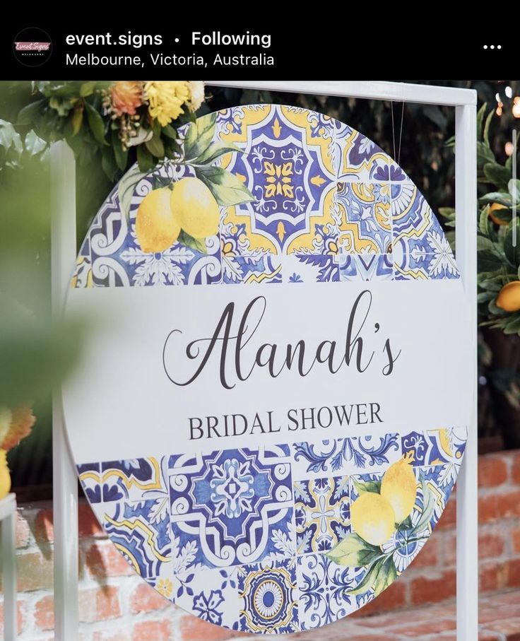 a blue and white sign that says alunah's bridal shower on it