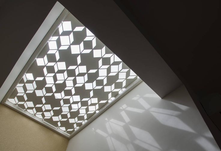 the ceiling is made up of white squares