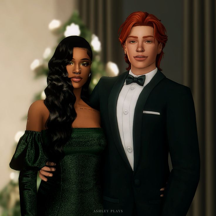 a man and woman dressed in formal wear standing next to each other near a christmas tree