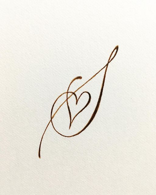 a heart drawn on top of a piece of paper with the letter s in it