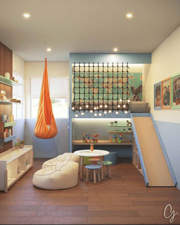 a child's playroom with toys and decor on the walls, including a slide