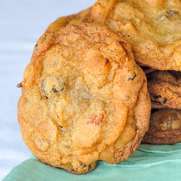 chocolate chip cookies stacked on top of each other