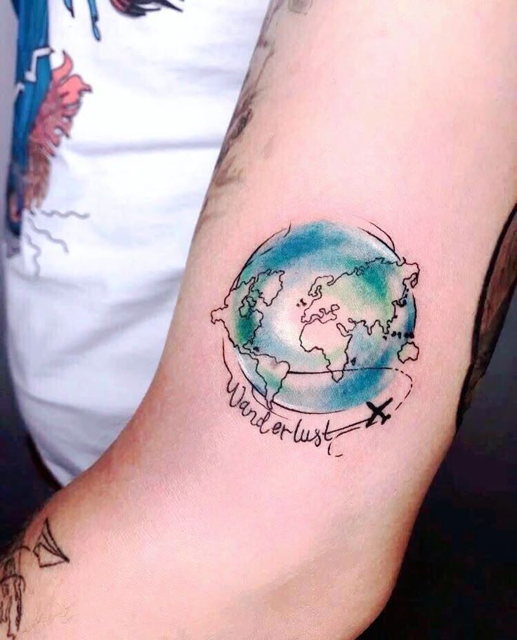 NOT MY PIC, PLEASE DM FOR REMOVAL/CREDIT. Visit BookOnBoard.com for travel tattoo ideas. Travel inspired tattoos design- travel tattoos for women unique, adventure tattoo, minimalist symbols, tiny, world, matching, simple, sleeve, time, quotes, fine line, compass, traveling tattoos, couple, travel tattoo for men, guys, best friend, dainty, geometric, love, cute, solo, roadless, heart, watercolor, bike, plane, ship, camera, mountain, sun, moon, globe, forearm #traveltattooinspiration #wanderlust Watercolor World Tattoo, Watercolor Globe Tattoo, Watercolor World Map Tattoo, Watercolor Travel Tattoo, Globe Tattoo Design, Earth Tattoo Design, Stargate Tattoo, World Globe Tattoos, Tattoo Ideas Travel