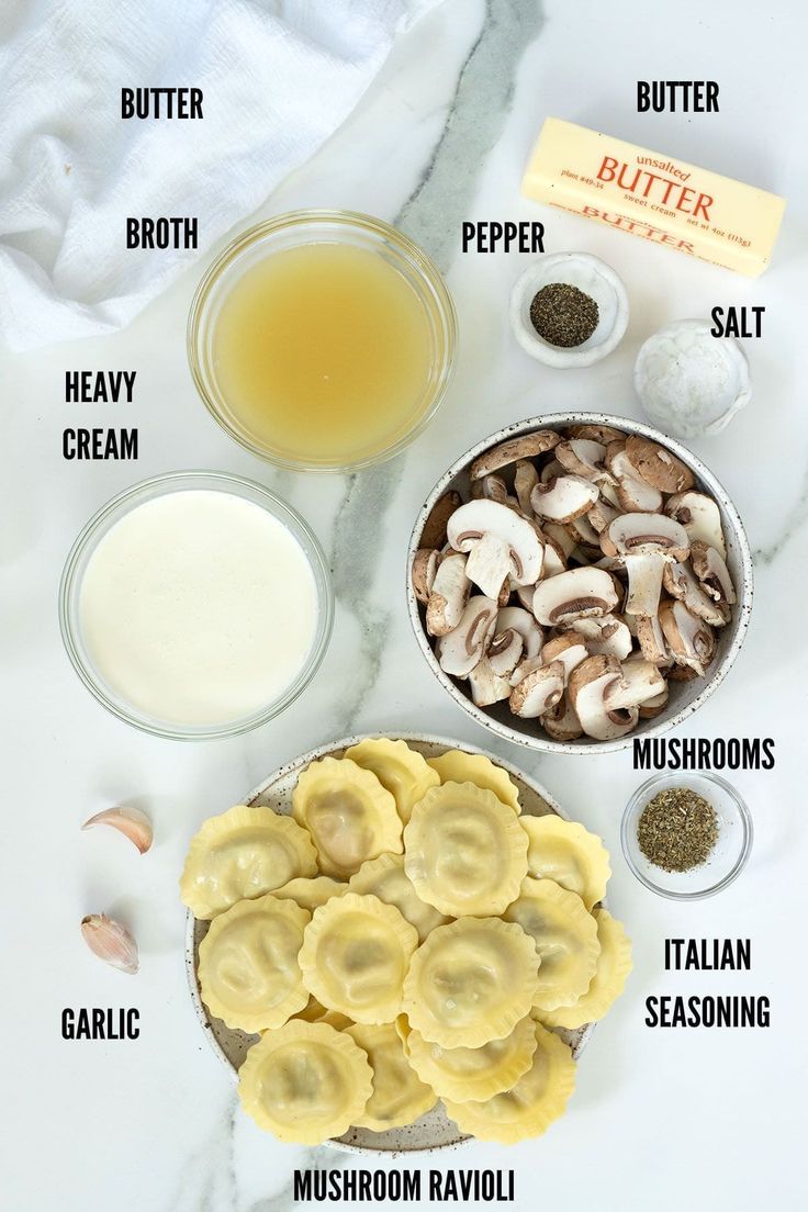 ingredients to make mushroom soup on a marble counter top