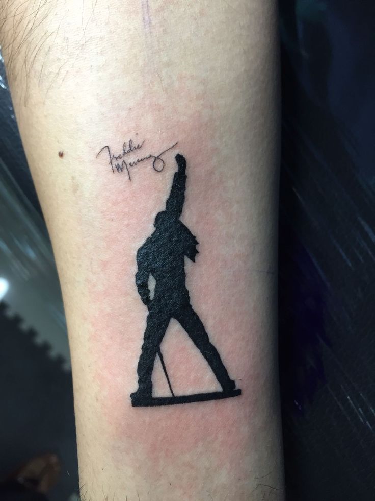 a person with a tattoo on their arm