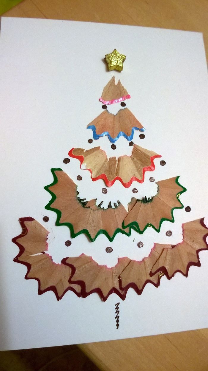 a christmas tree made out of colored pencils