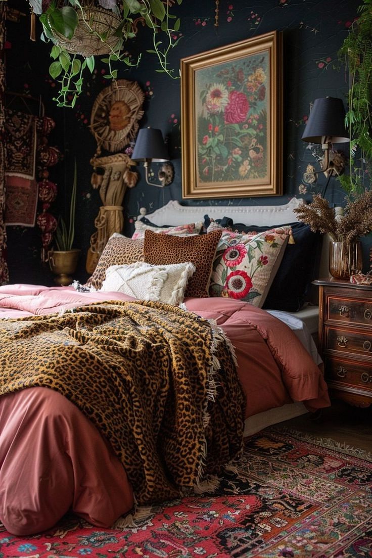 a bedroom decorated in leopard print and pink bedding, with an animal print blanket