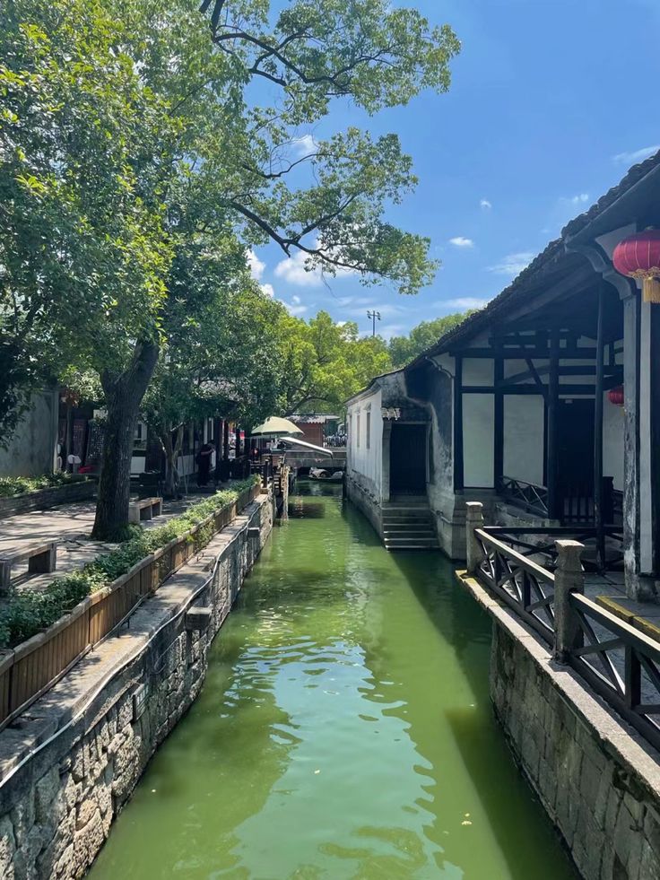 the water is green in this small canal