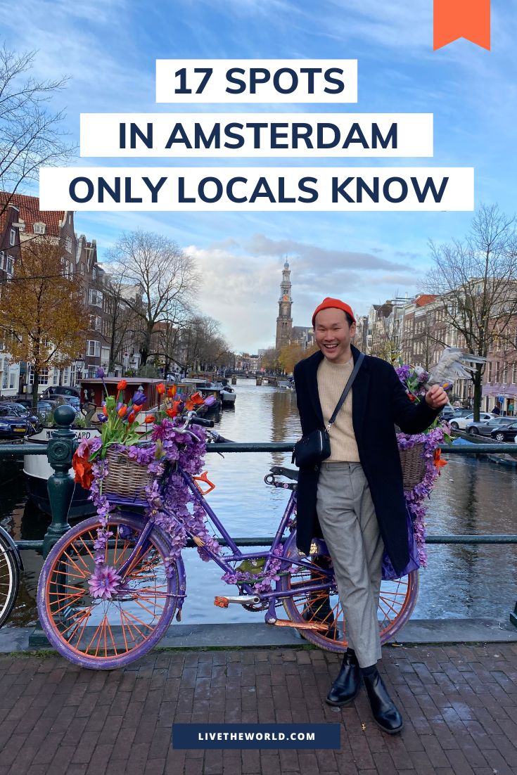 a man standing next to a purple bike with flowers on it and the words 17 spots in amsterdam only locals know