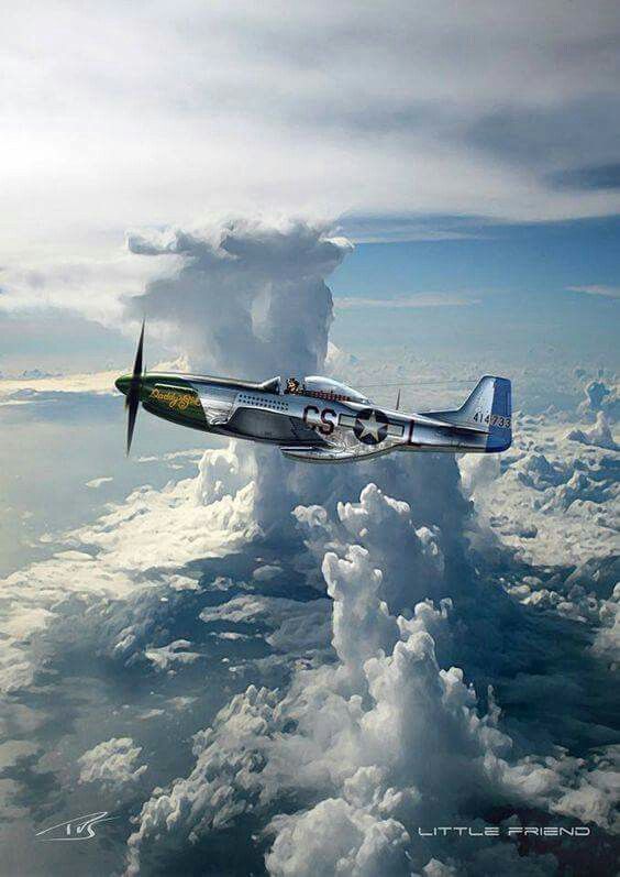 an airplane flying in the sky above clouds