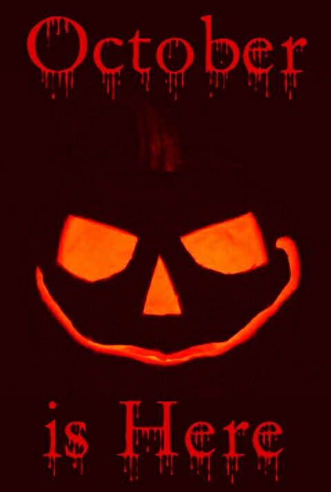 an image of a scary pumpkin with the words october is here