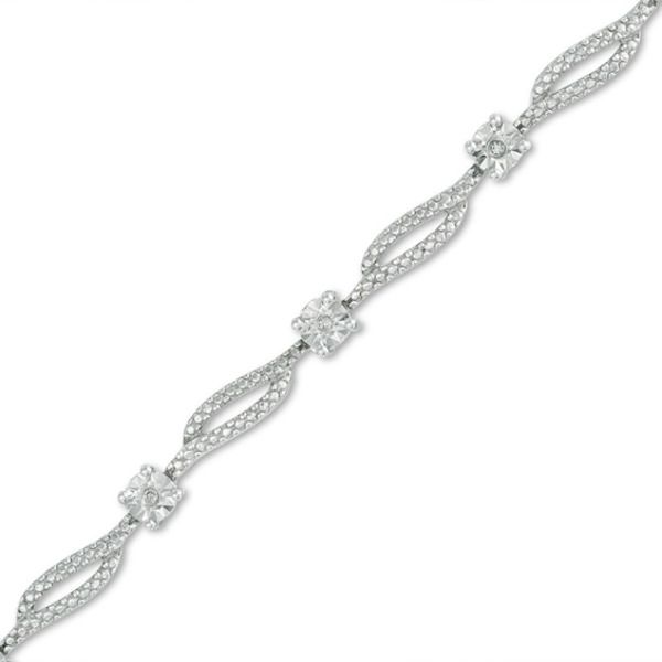 Make an elegant statement with this darling diamond fashion bracelet. Expertly crafted in sleek sterling silver, this bracelet features twisting textured ribbons separated by shimmering diamond accent stations. A lovely look anytime, this 7.25-inch bracelet is finished with a bright polished shine and secures with a durable lobster claw clasp. Diamond Fashion, Diamond Bracelets, Christmas Sale, White Metal, Diamond Stone, Diamond Clarity, Bracelet Designs, Lobster Claw, Sterling Silver Bracelets