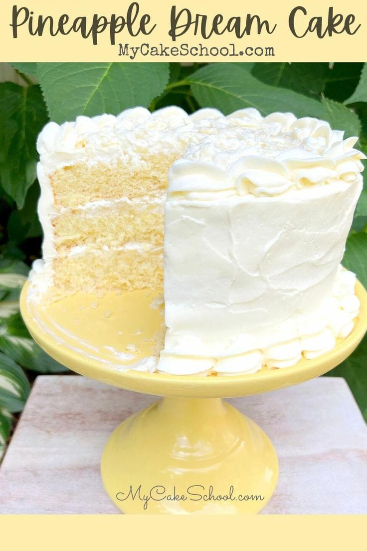 a yellow cake with white frosting is on a plate and has the words, how to make a pineapple dream cake