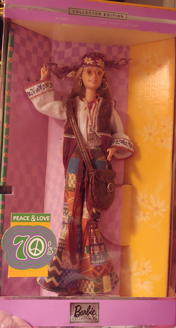 a barbie doll in a box on display