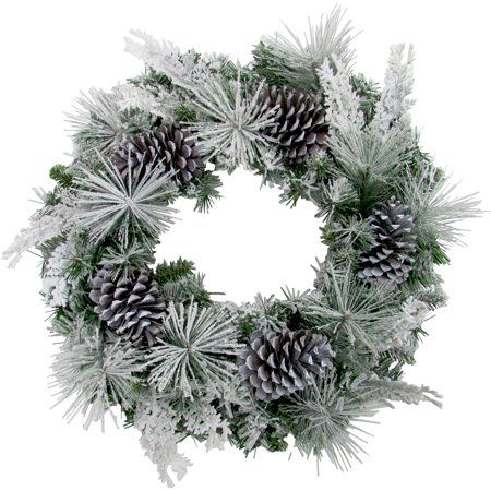 a christmas wreath with pine cones and snow flakes on it, isolated against a white background