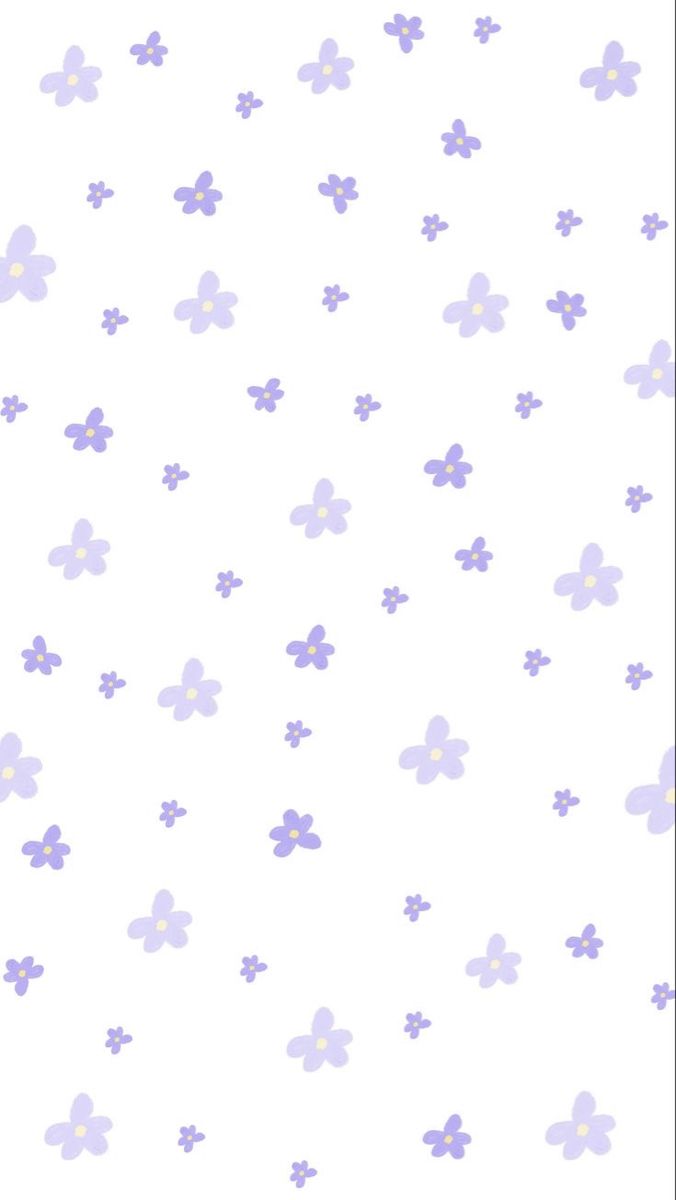 a white and purple wallpaper with small flowers on the left side of the wall