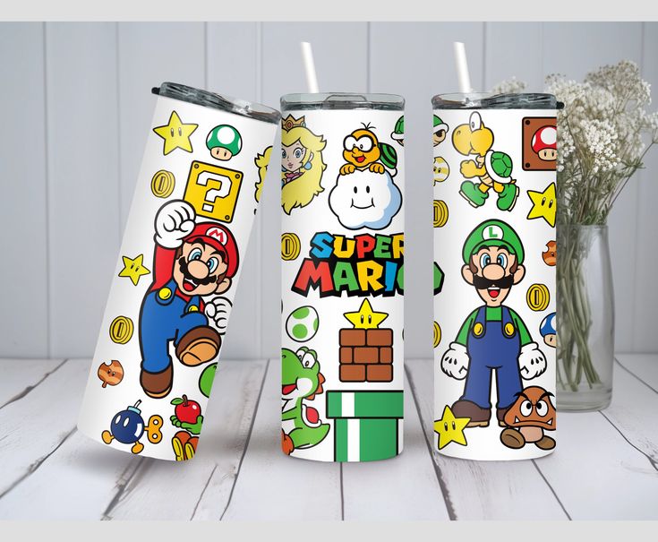 two cups with mario and other cartoon characters on them