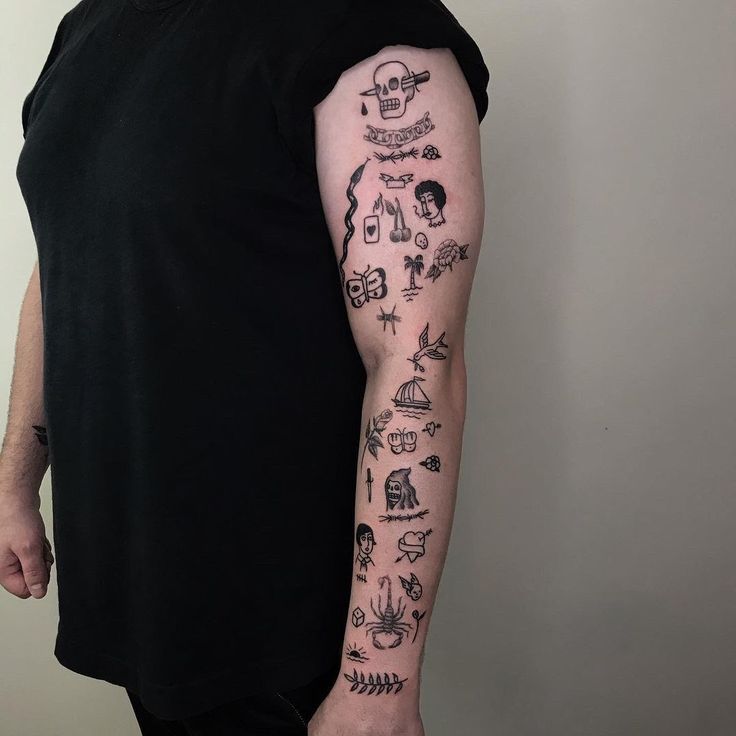 a man with a tattoo on his arm