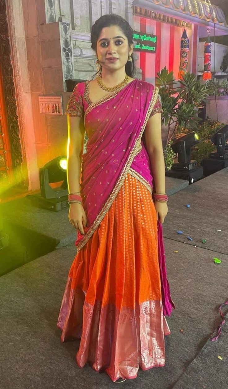 Pattu Saree Half Saree, Orange Pink Half Saree, Half Saree Simple Traditional, Dhavani For Wedding Function, Simple Langa Voni Half Saree, Red And Purple Half Saree, Red Pattu Lehenga Half Saree, South Indian Lehenga Half Saree Simple, Chiffon Half Saree