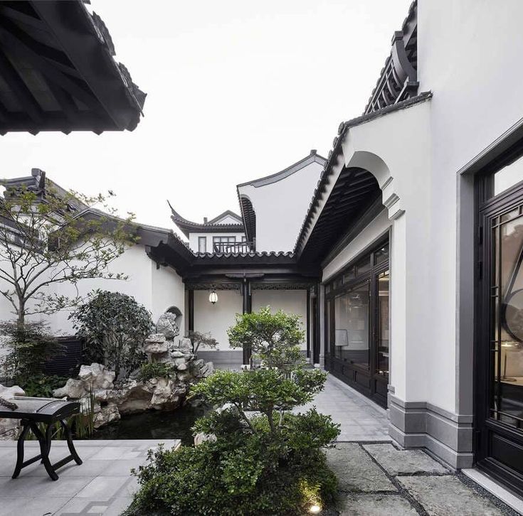 an outdoor courtyard is shown in black and white