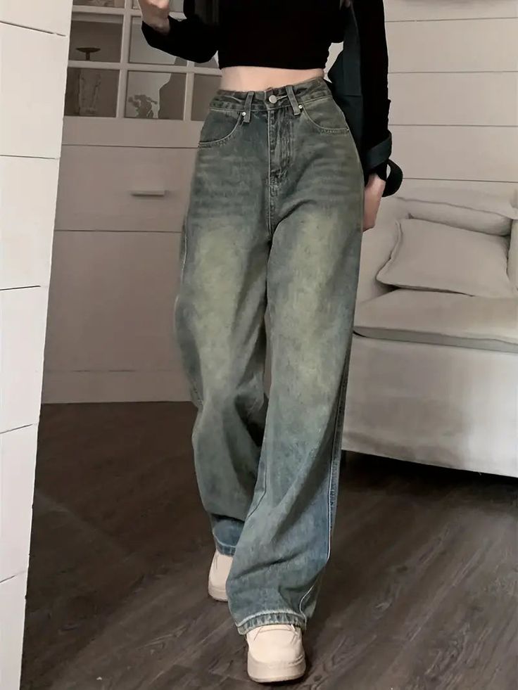 Refresh your denim collection with these statement-making wide-leg jeans that speak volumes about your impeccable taste. With a serene greenish wash and a tactile texture, they're the epitome of understated elegance. Their free-flowing design not only offers supreme comfort but also adds a dash of vintage charm to your ensemble. Rock them with a simple black crop top, lace-up flats, and a crossbody bag for a casual yet sophisticated vibe.Pattern:Bell-bottomsOccasion:Casual/DailyMaterial:PolyesterColor:GraySize:S,M,L,XL, Baggy Green Denim Bottoms, Green Wide Leg Jeans For Fall, Green Wide Leg Washed Bottoms, Green Washed Wide Leg Bottoms, Green Washed Wide-leg Bottoms, Green High Rise Relaxed Fit Jeans, Green Wide Leg Denim Bottoms, Green Wide Leg Pants With Five Pockets, Green High-rise Flare Jeans