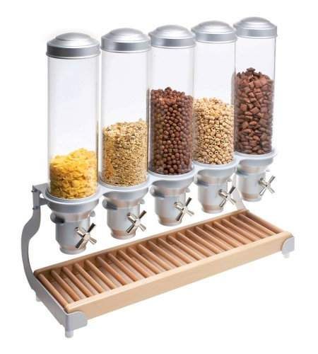 the four containers are filled with different types of cereals and grains, along with their respective dispensers