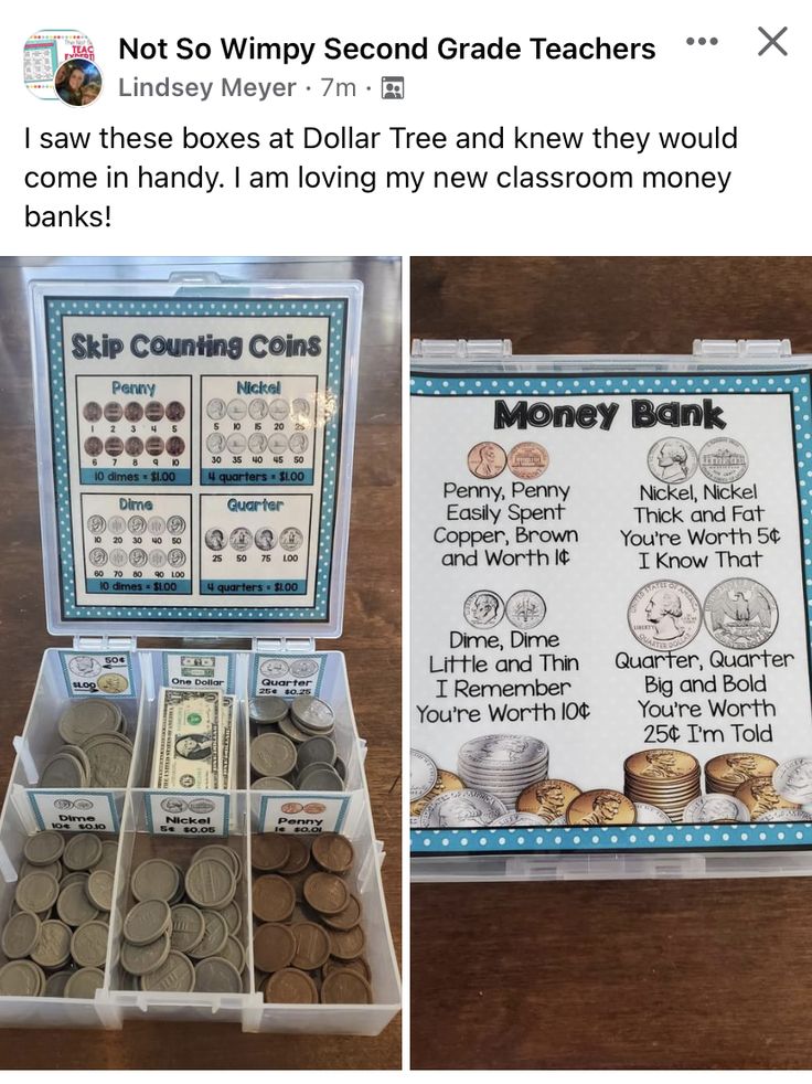 a box filled with lots of money sitting on top of a wooden table next to a sign