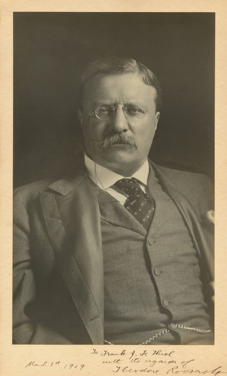 an old black and white photo of a man with a mustache