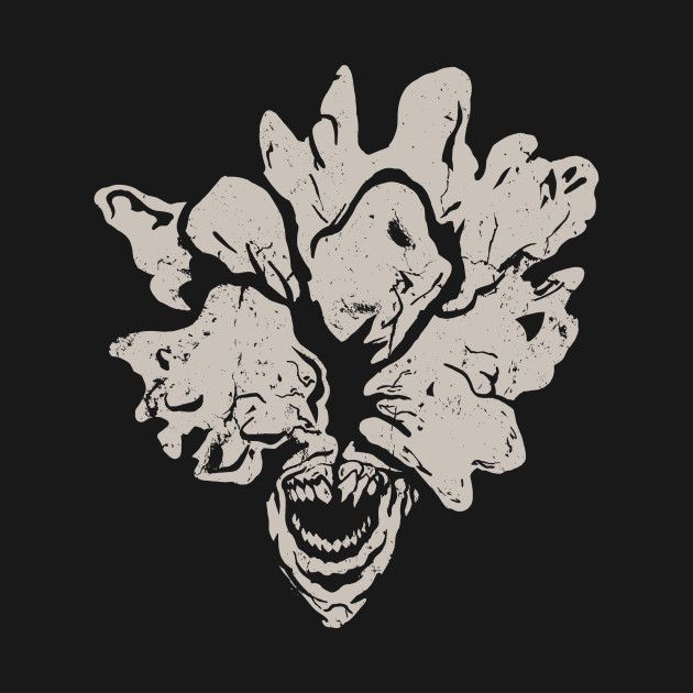 a black and white drawing of an evil clown's head with his mouth open