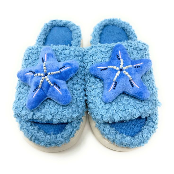 With their starfish motif and beachy vibes, these soft and cozy slides transport you to the tranquil shores with every step. Enjoy these super soft women's novelty slip-on slides from our partners at Oooh Geez! Slippers. Stay warm & look great with your new startfish themed blue fuzzy hard sole slides. Wear them around the house or out and about thanks to the non-skid rubber bottom. Pick up a pair today! Info Style: Sherpa slides with non-skid rubber bottom sole. Size: Small fits women's U.S. sh Slipper Design, Fuzzy Slides, Cotton Slippers, Slides For Women, Beachy Vibes, Slide Slippers, Sock Animals, Fuzzy Slippers, Designer Slippers