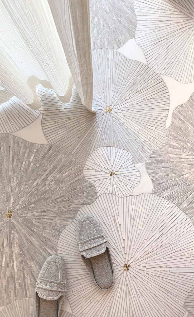 an artisticly designed wallpaper with white umbrellas