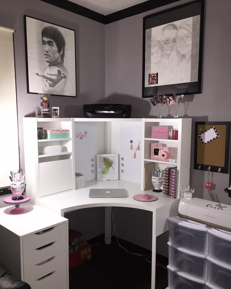 a white corner desk with lots of drawers