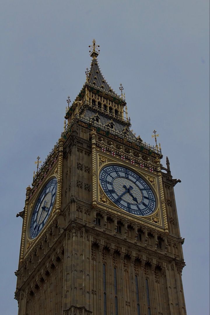 the big ben clock tower towering over the city of london